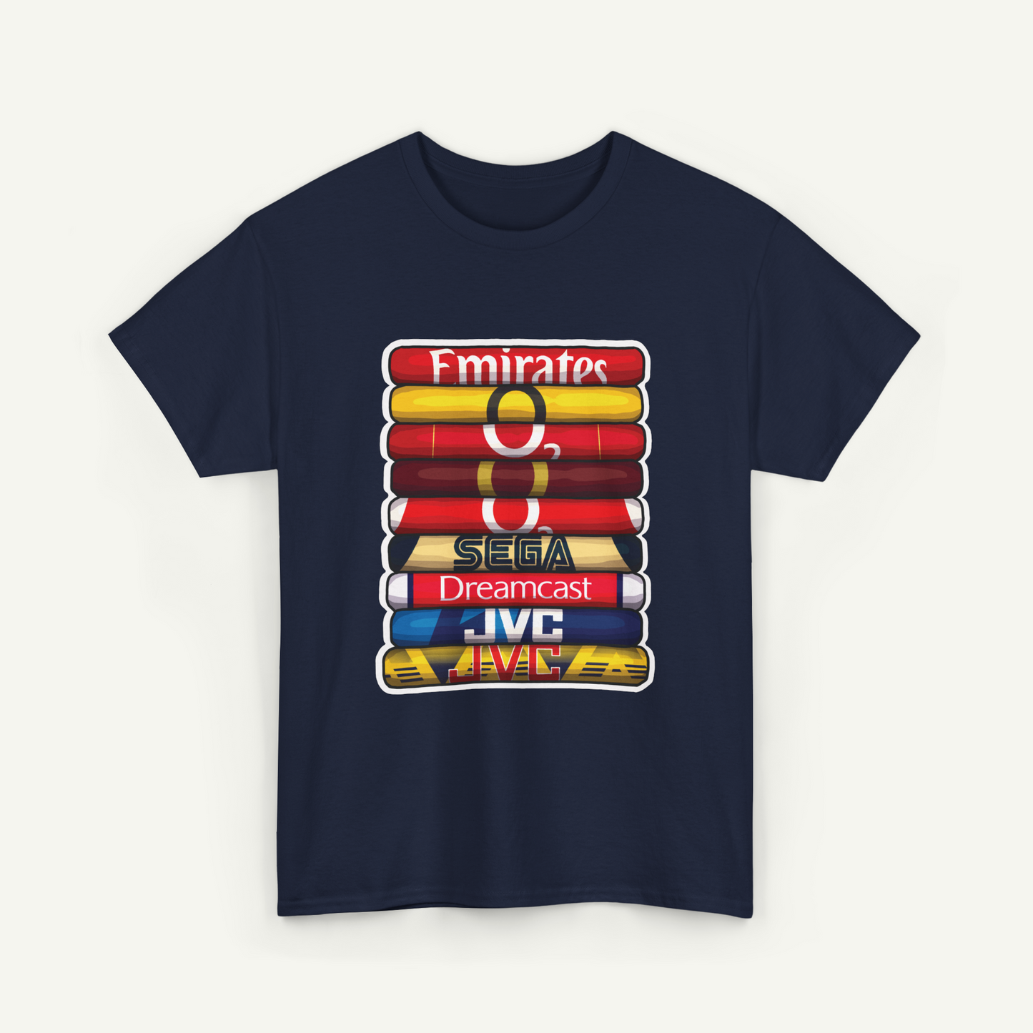 A navy blue t-shirt with a graphic design featuring a stack of colorful books or magazines, each with a different logo or brand name printed on it.