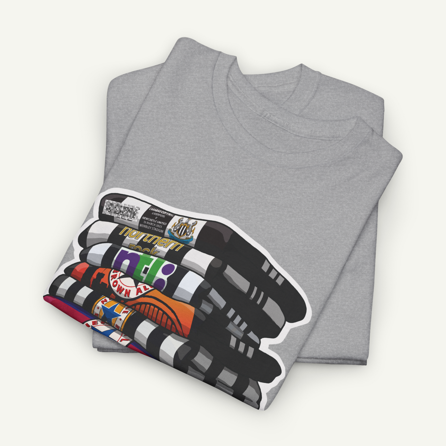 a gray t-shirt with a colorful graphic design on the front, which appears to be a stack of crayons.