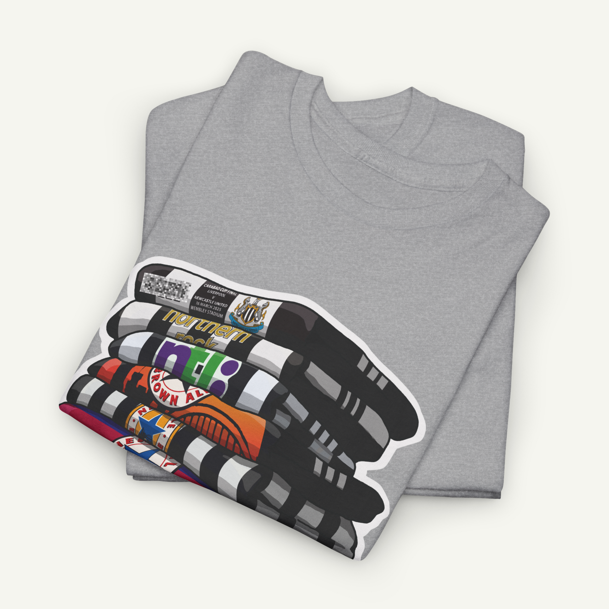 a gray t-shirt with a colorful graphic design on the front, which appears to be a stack of crayons.