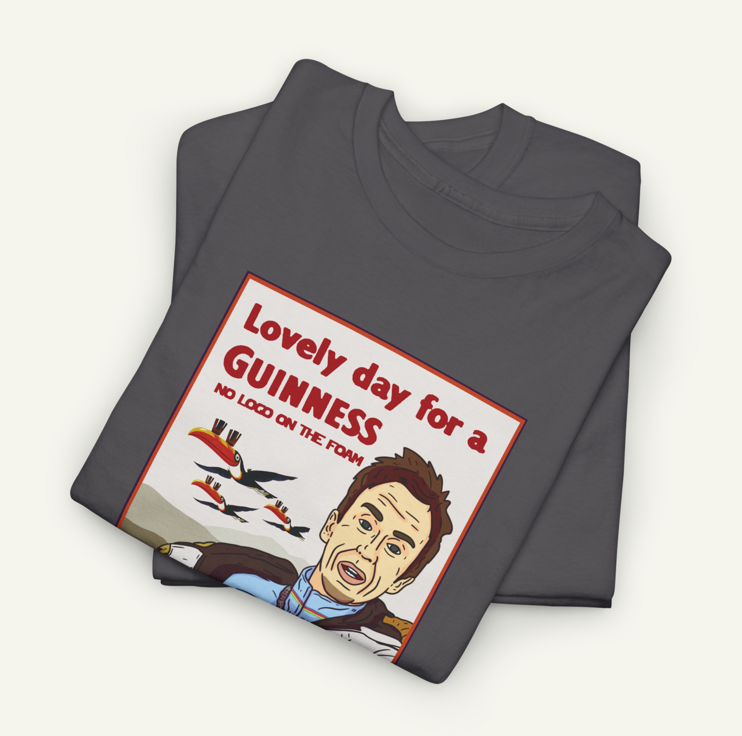 a gray t-shirt with a graphic design depicting a man's face and the text "Lovely day for a Guinness" printed on it.