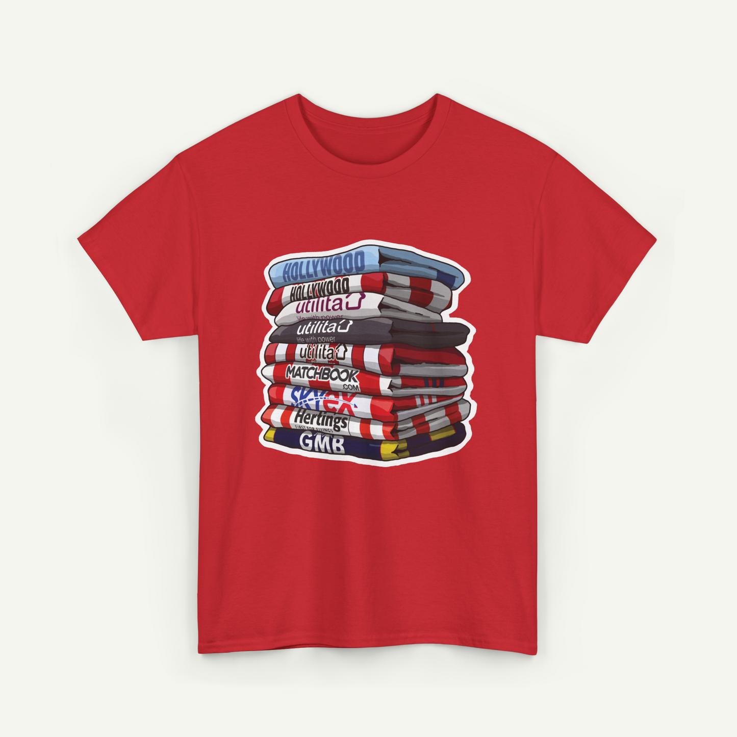 A red t-shirt with a graphic design depicting a stack of books with various titles written on them.