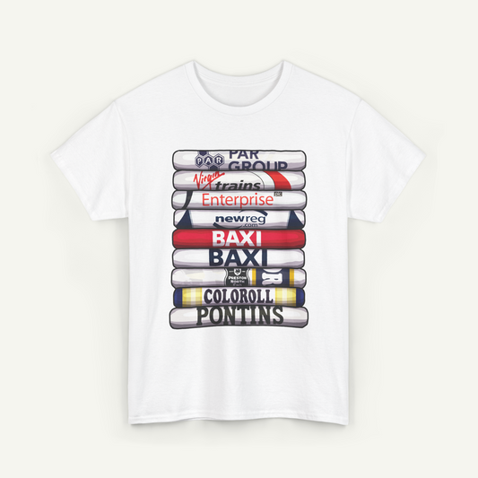 A white t-shirt with a graphic design featuring a stack of colorful books with various text and logos printed on them.