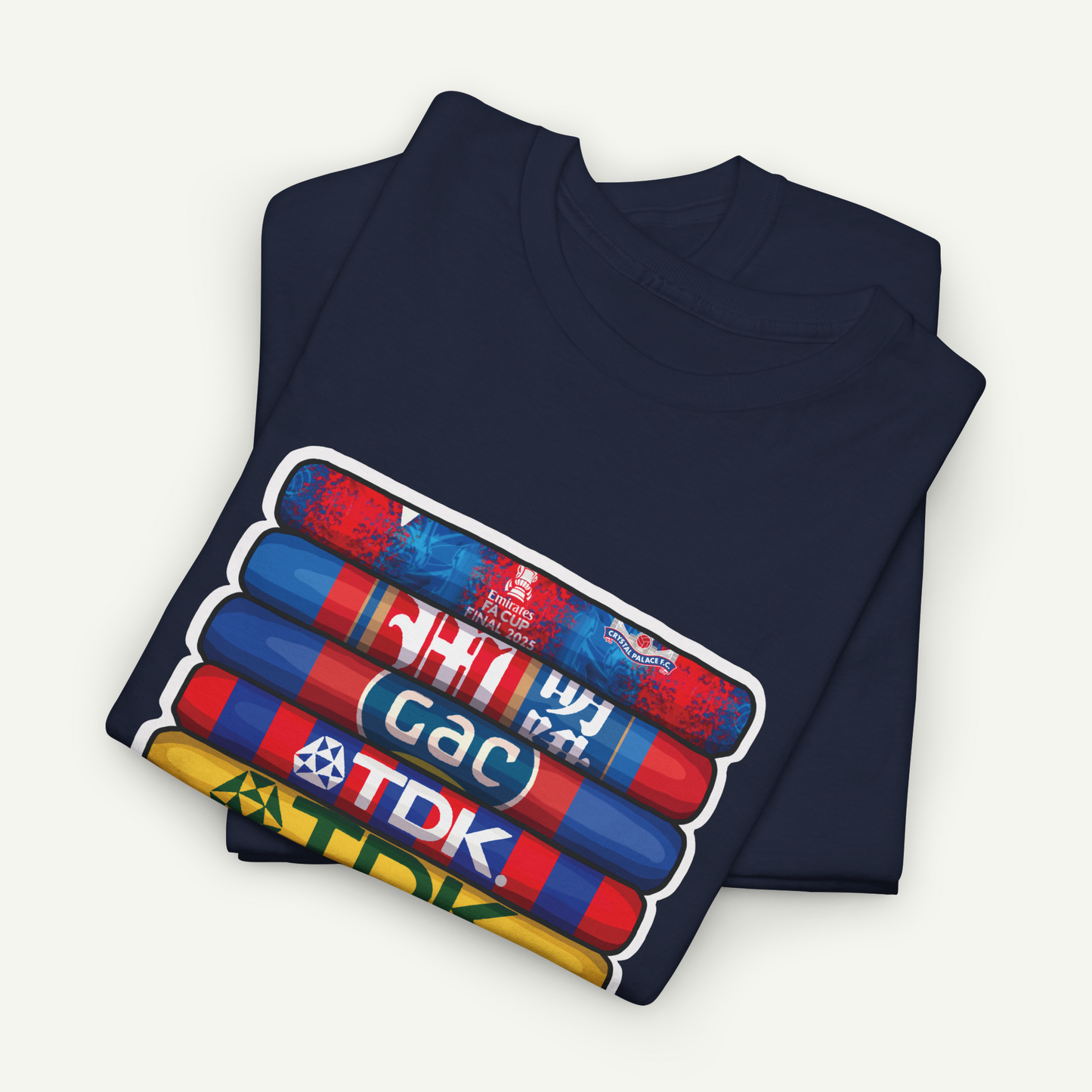 A navy blue t-shirt with a graphic design featuring a stack of colorful tubes or cylinders with text on them.