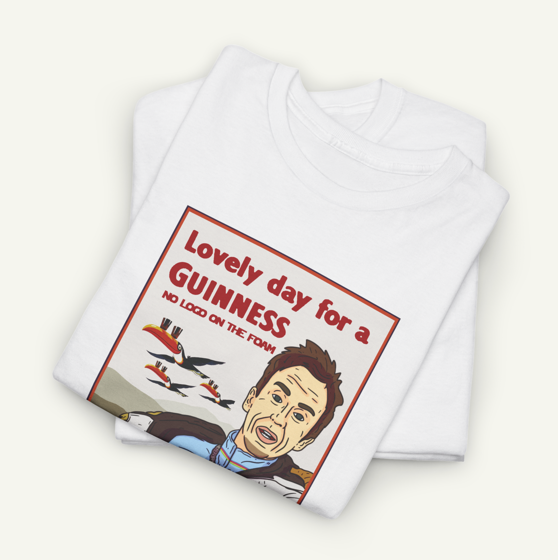 a white t-shirt with a graphic design depicting a man's face and the text "Lovely day for a Guinness no loads on the foam".