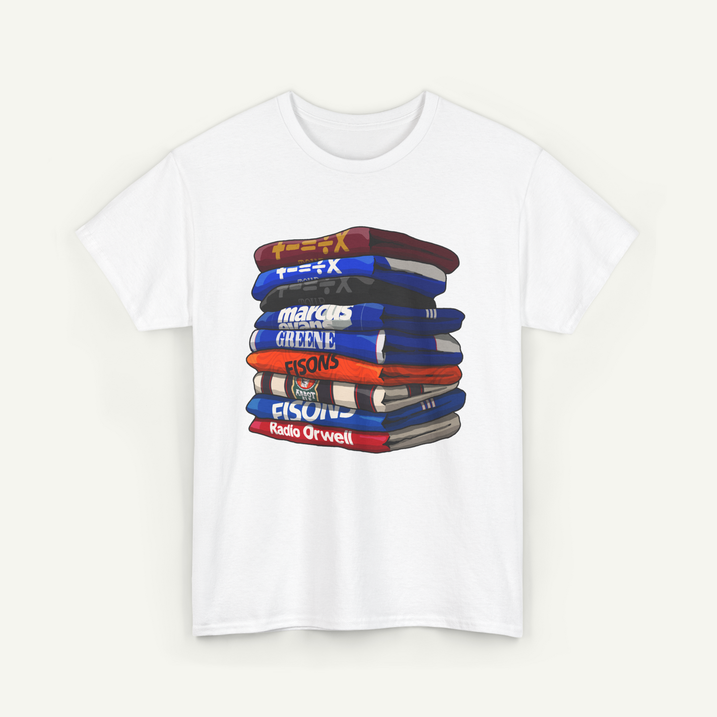 A white t-shirt with a graphic design depicting a stack of colorful books or magazines.