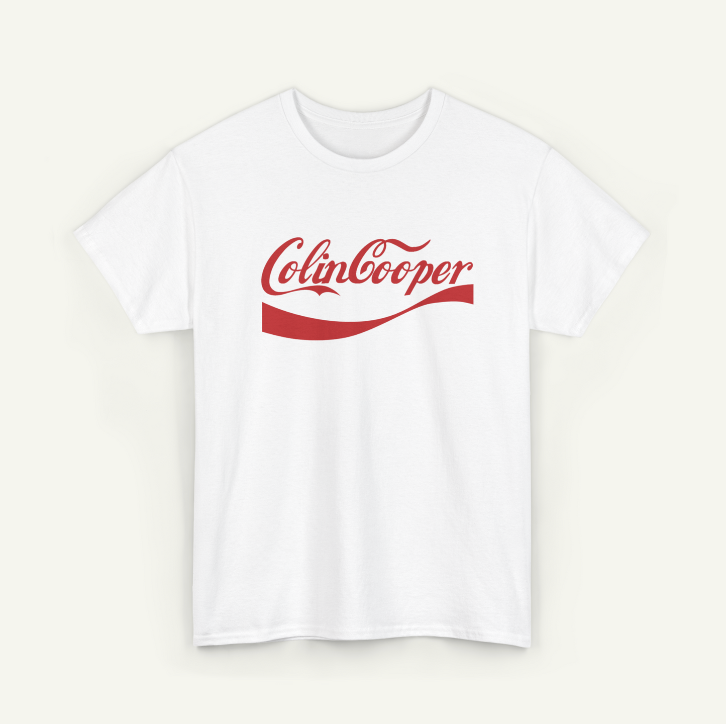 A white t-shirt with a red Coca-Cola logo printed on it.