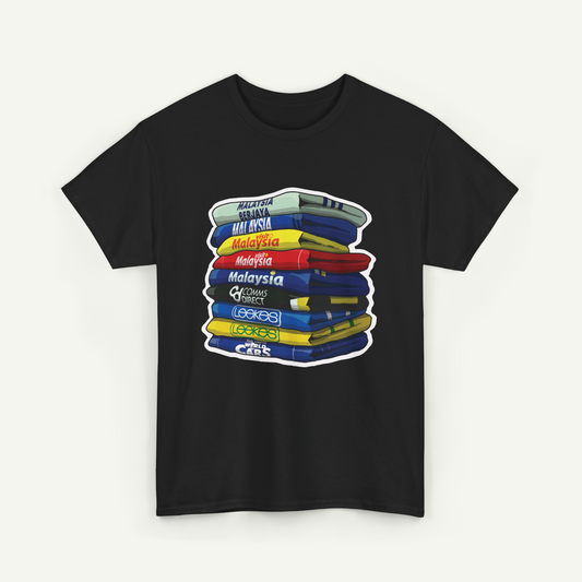 A black t-shirt with a graphic design depicting a stack of colorful books or books, representing the countries of Malawi, Malaysia, and other countries in Africa.