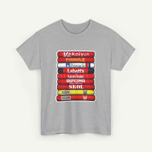 A gray t-shirt with a graphic design depicting a stack of colorful books or magazines with various text titles on the spines.