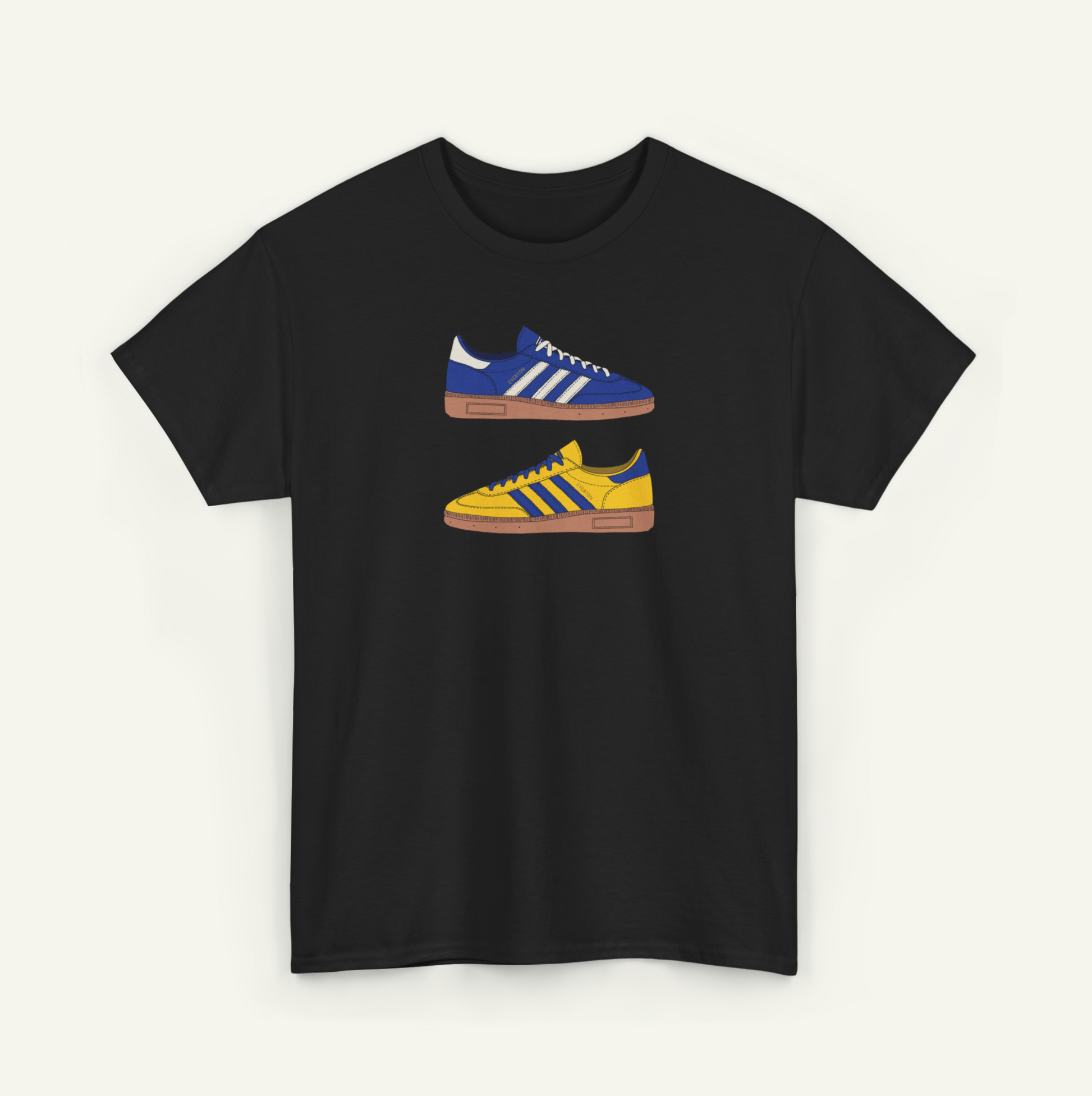 A black t-shirt with a graphic design of two Adidas sneakers in blue and yellow colors.