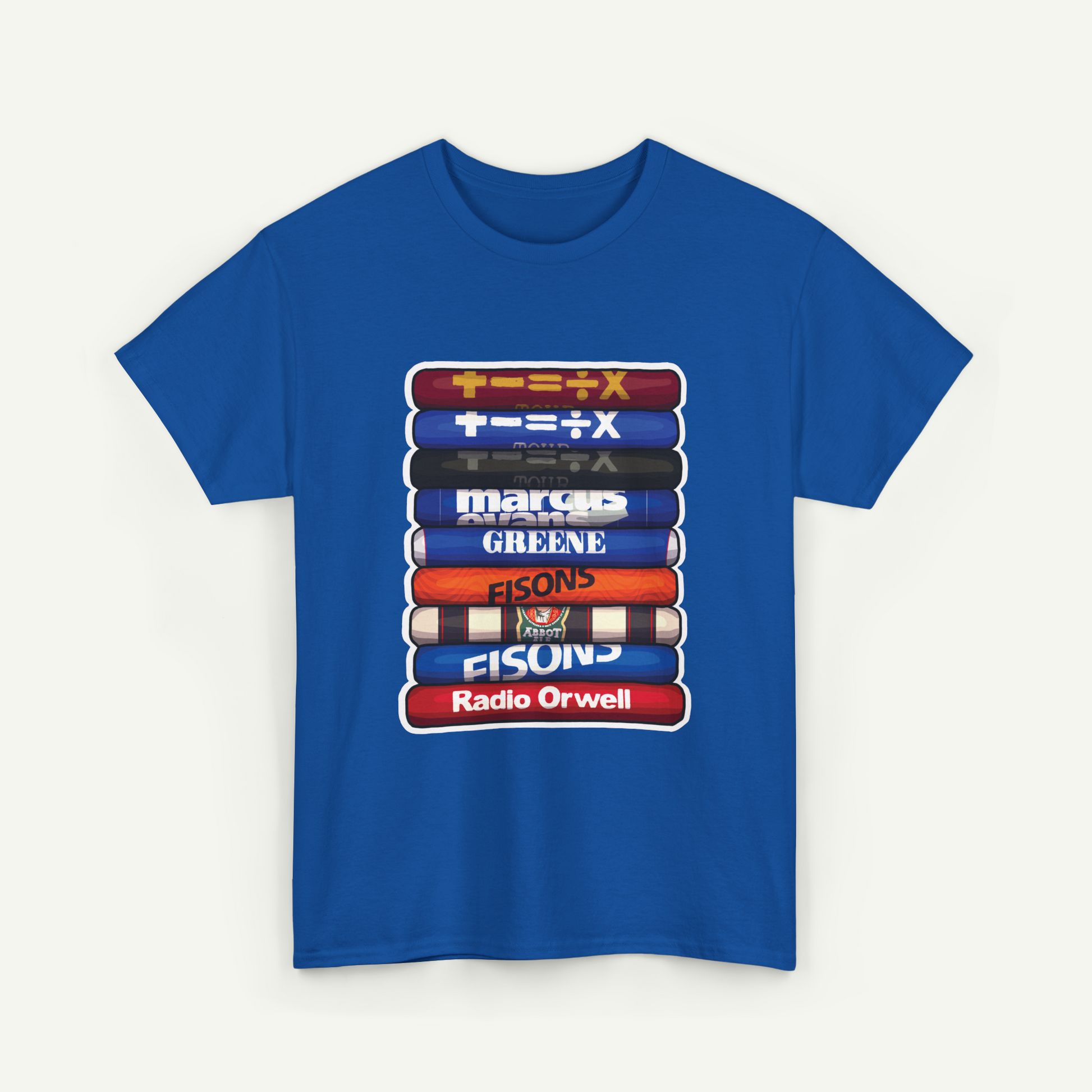 A blue t-shirt with a graphic design depicting a stack of colored books or magazines, each with a different title or logo, such as "FISONS" and "Radio Orwell".