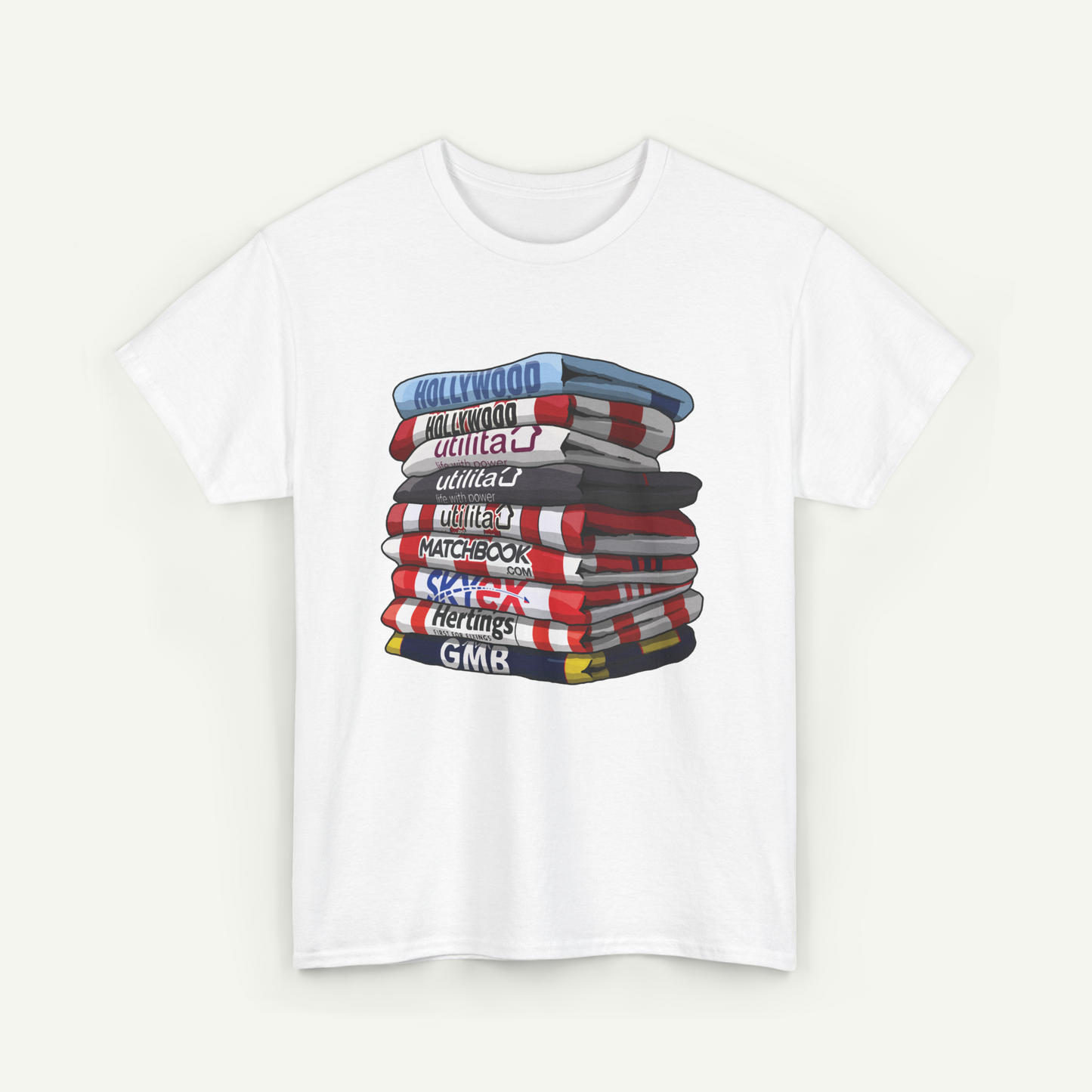 A white t-shirt with a graphic design depicting a stack of books with various titles written on them.