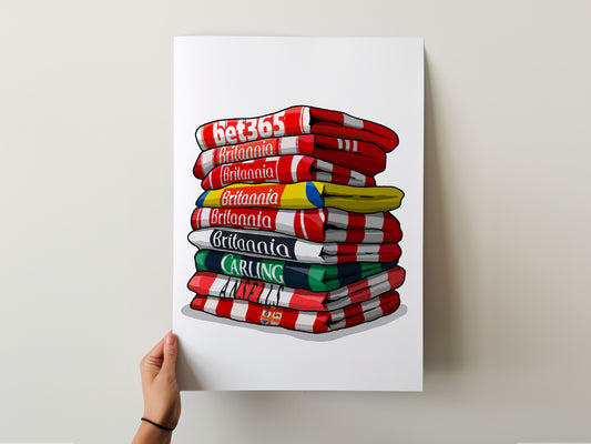 A hand is holding a poster with a stack of towels, each towel displaying a different brand name.