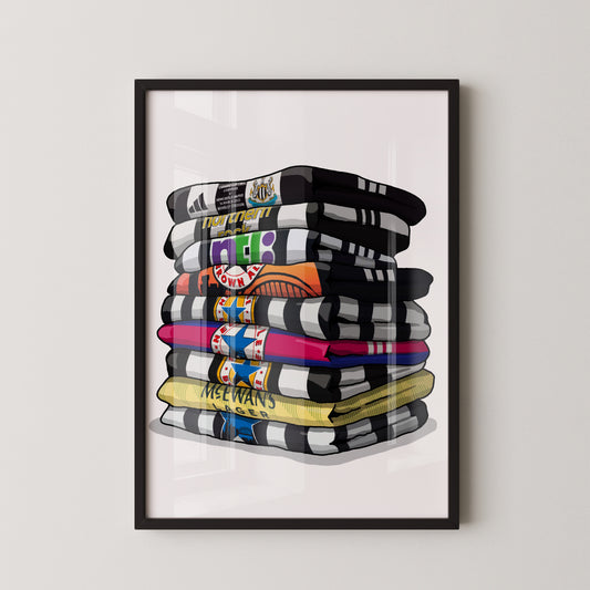 A framed illustration of a stack of colorful towels or blankets, each with a unique design or pattern.