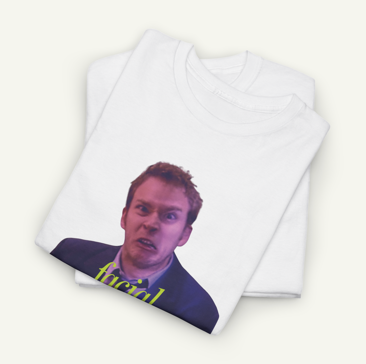 a white t-shirt with a printed graphic of a man's face, which appears to be a humorous or comical expression.