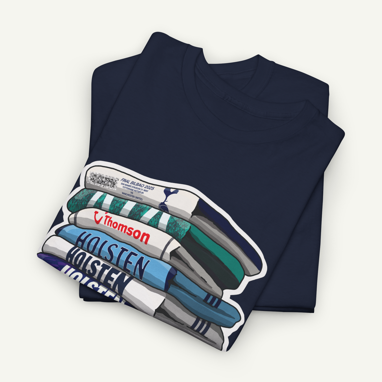 A navy blue t-shirt with a graphic design depicting a stack of books or magazines.