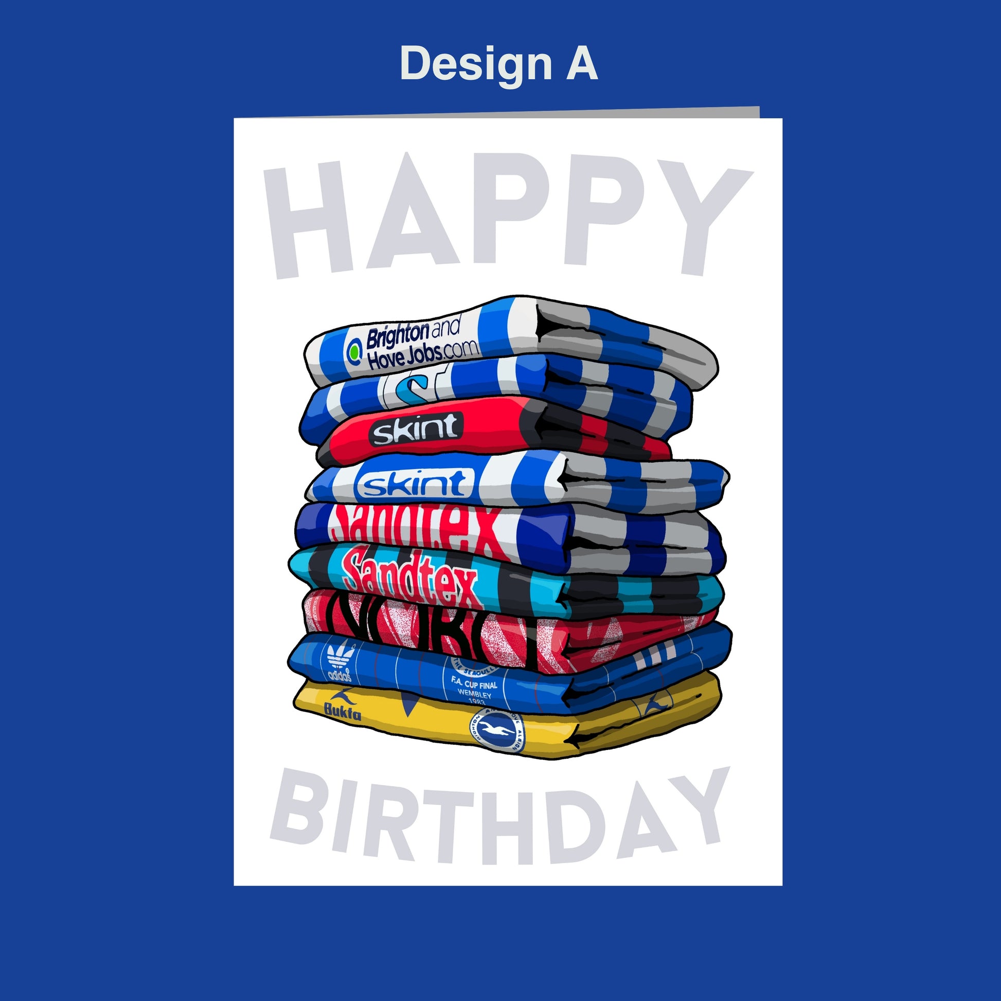 A stack of colorful towels with various logos, including "Skint", "Nordex", "SANDEX", and "Bike". The text "Design A" is displayed above the towels, and "HAPPY BIRTHDAY" is written below the stack.