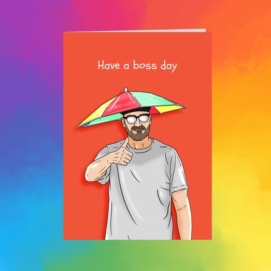 A man wearing a colorful umbrella hat is standing against a vibrant gradient background with the text "Have a boss day" displayed above him.