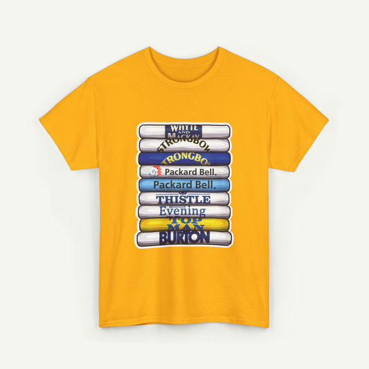 A yellow t-shirt with a graphic design featuring a stack of books with various titles and text on the spines.