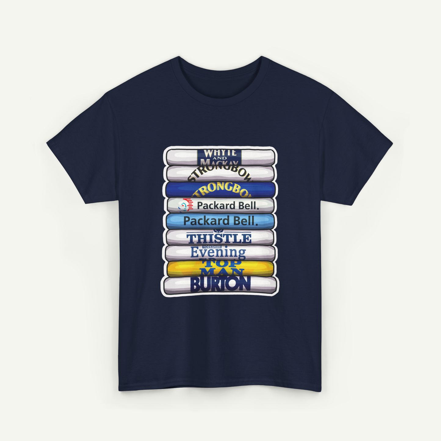 A navy blue t-shirt with a graphic design featuring a stack of books with various titles and logos printed on them.