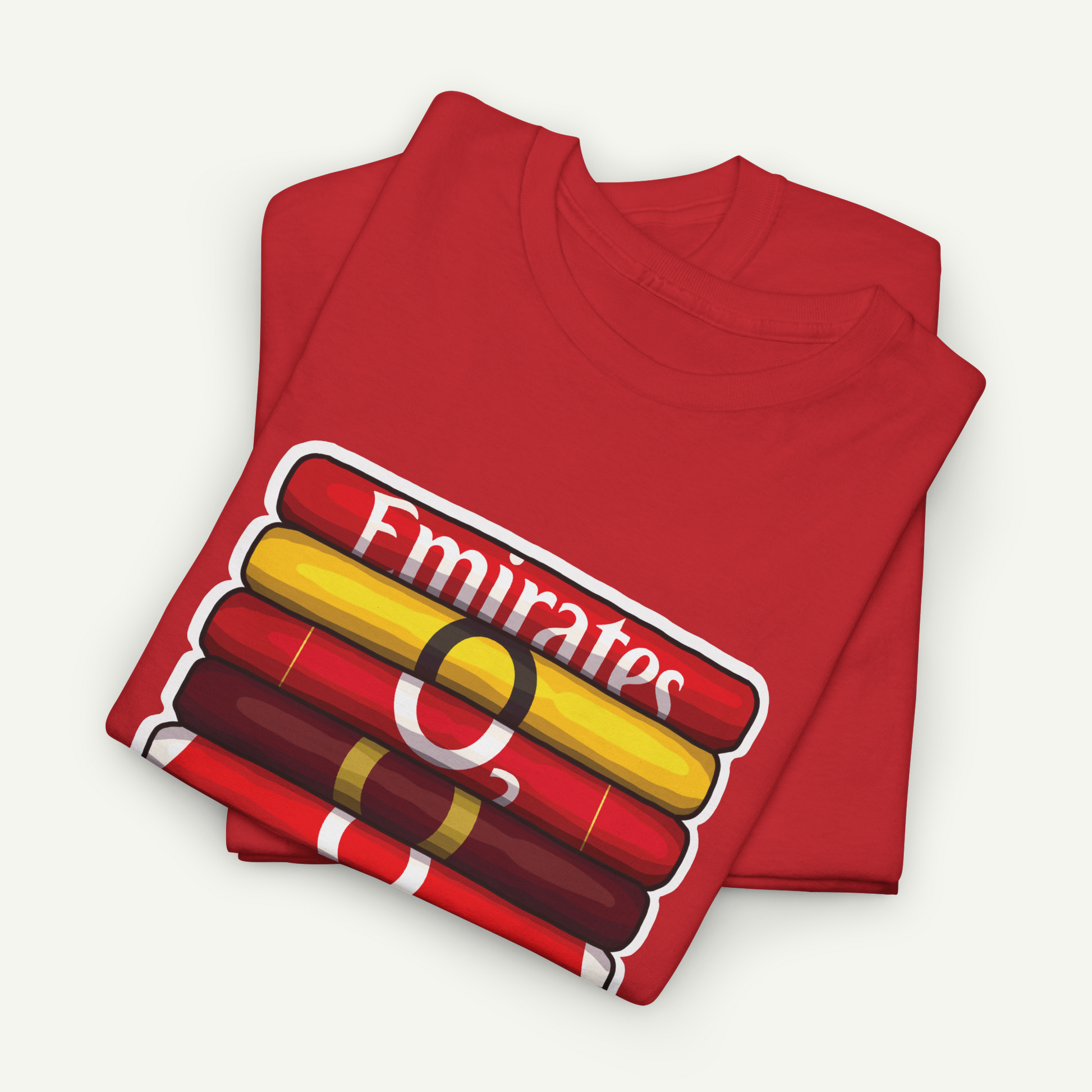 A red t-shirt with a graphic design featuring a stack of colorful tubes or cylinders, with the word "Emirates" written on the side.