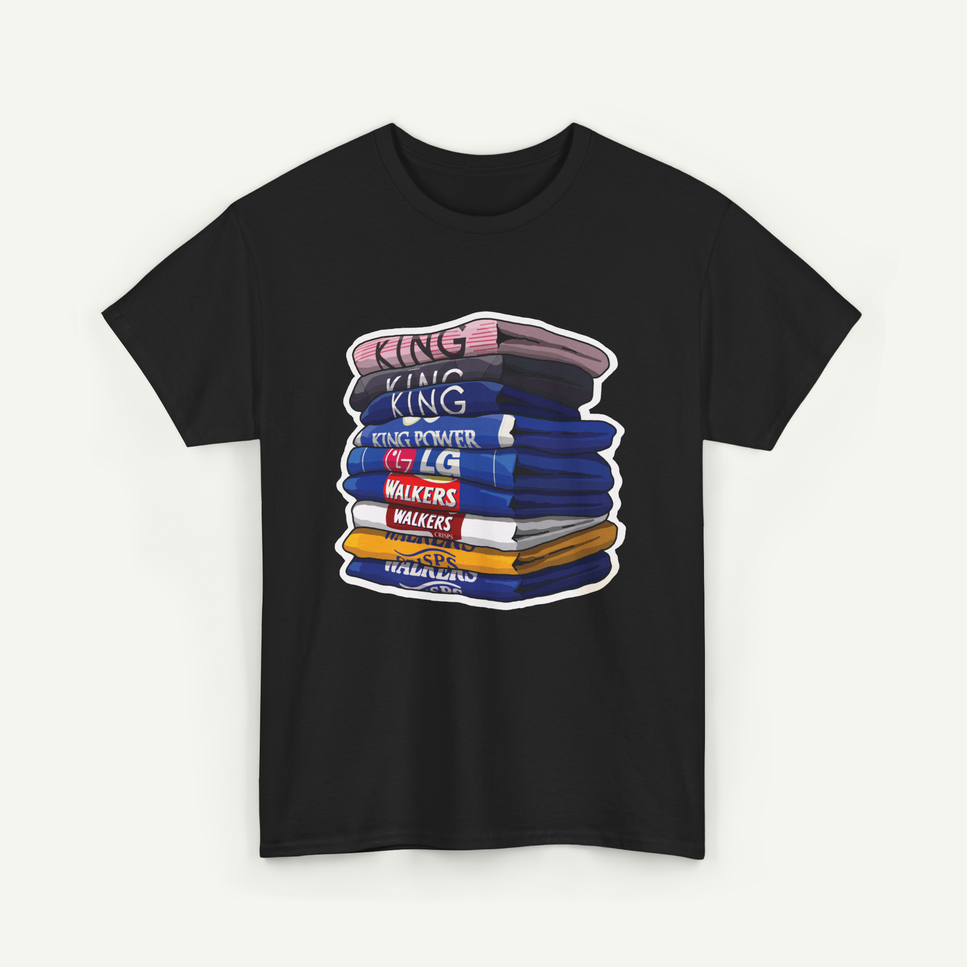 A black t-shirt with a graphic design depicting a stack of colorful books or books with the text "KING KING" written on them.