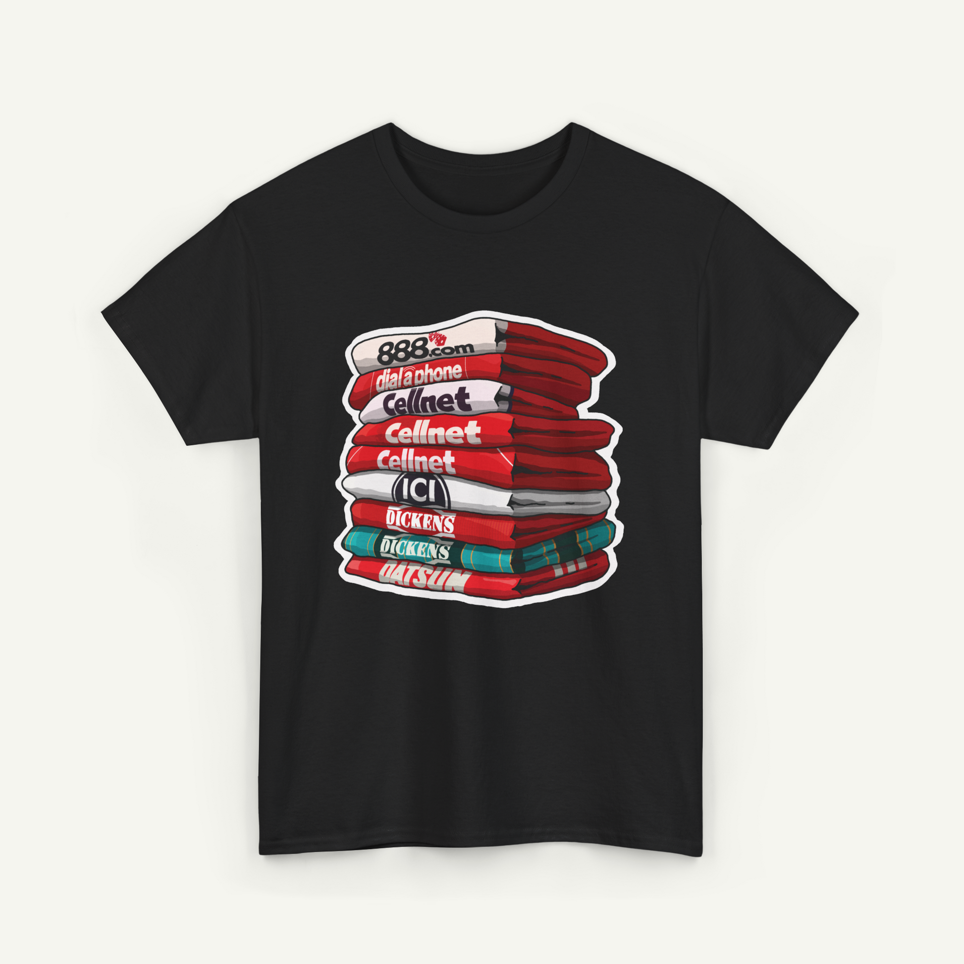 A black t-shirt with a graphic design depicting a stack of books or magazines with various titles and text.