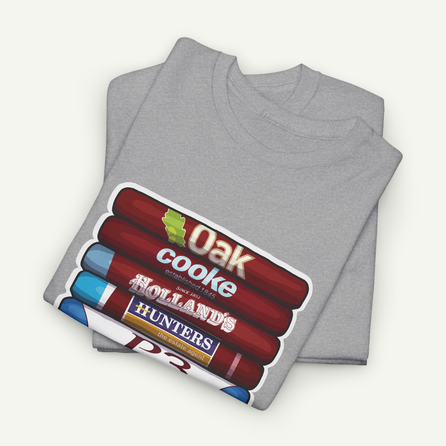 A gray t-shirt with a graphic design featuring a stack of red and blue tubes with text on them.