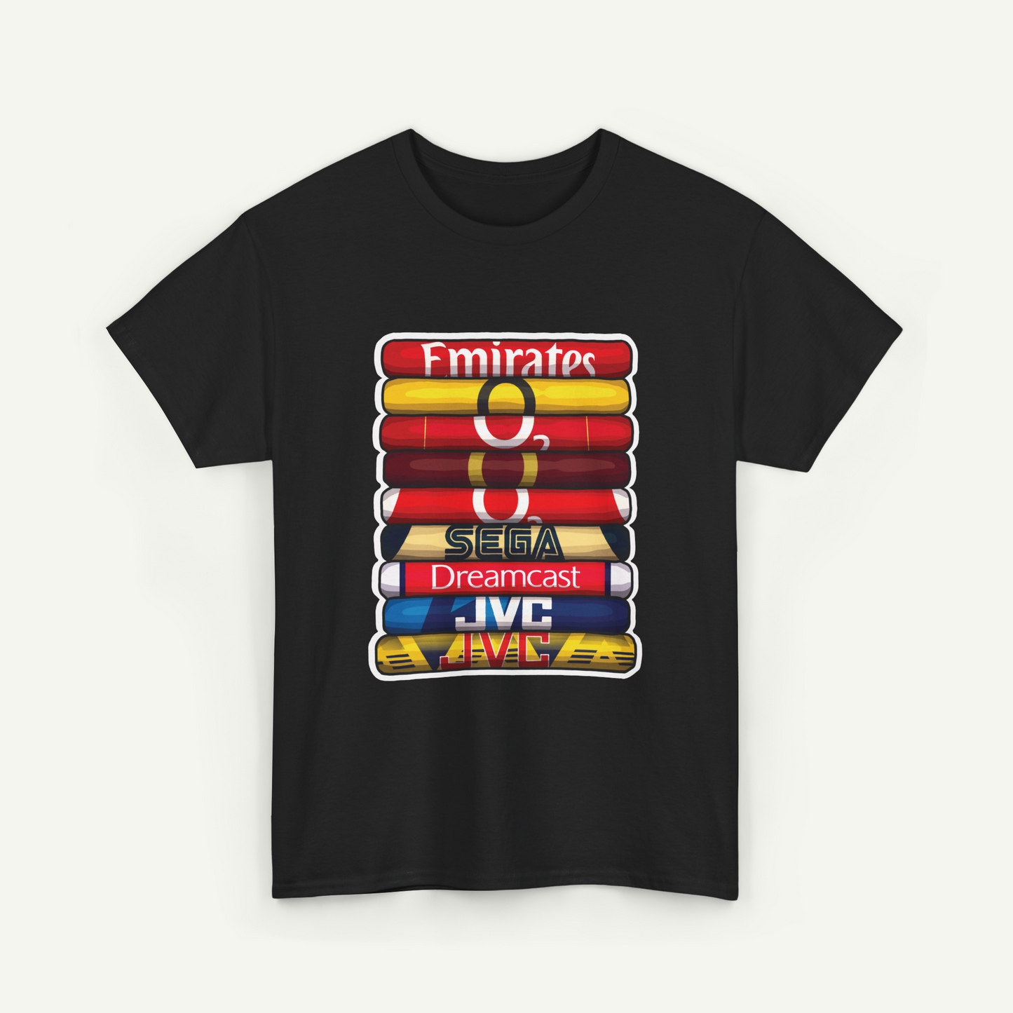 A black t-shirt with a graphic design featuring a stack of colorful books or magazines, each with a different logo or brand name printed on it.