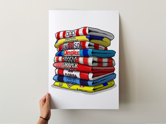 A hand is holding a poster with a stack of colorful towels, each with a different text label.