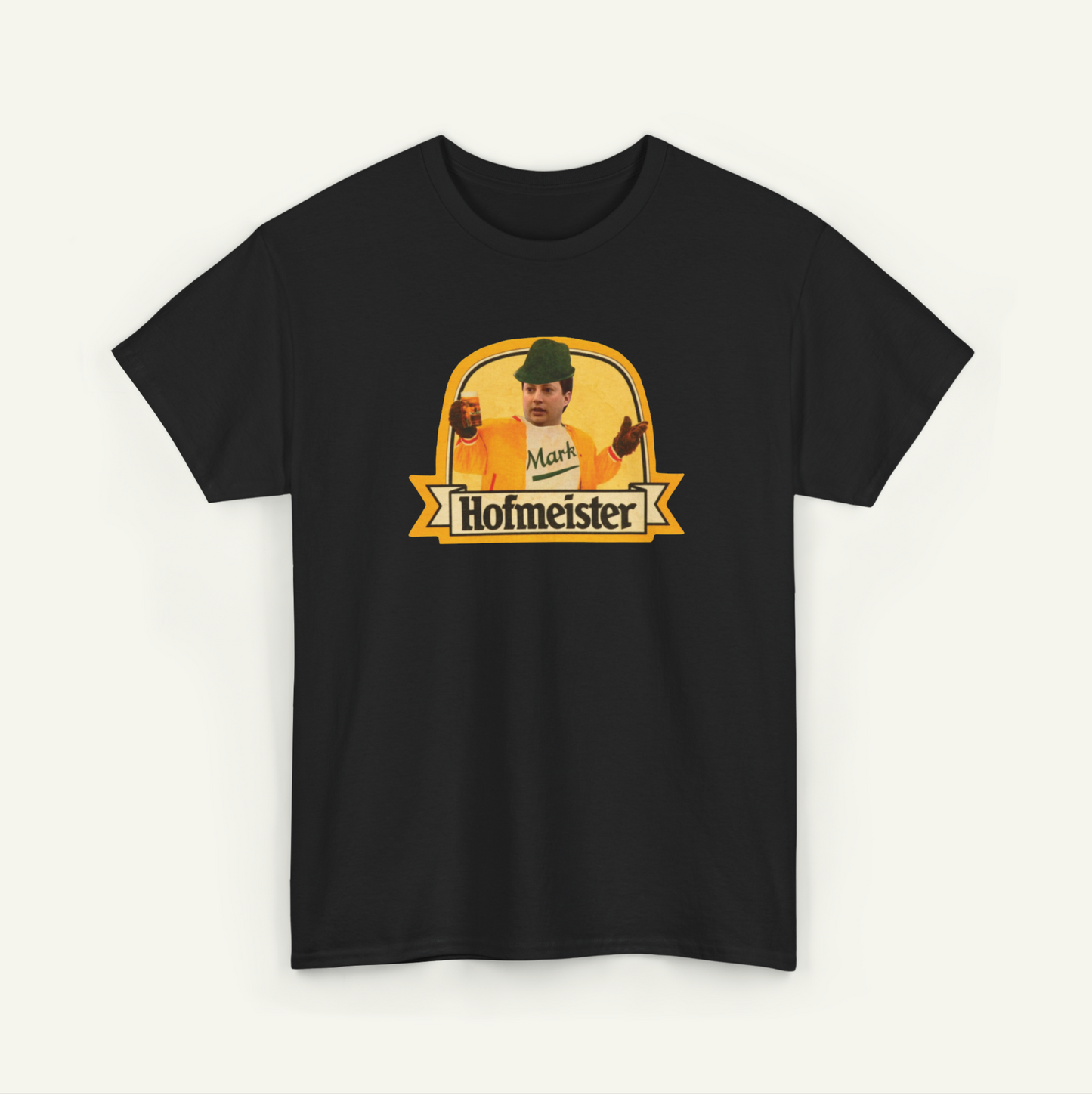 A black t-shirt with a yellow graphic design featuring a man wearing a hat and holding a beer bottle.