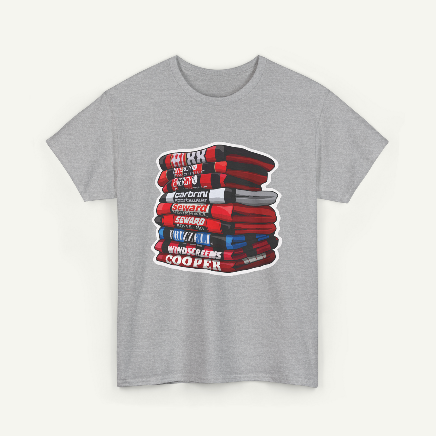 A gray t-shirt with a graphic design depicting a stack of books with various titles and authors' names.