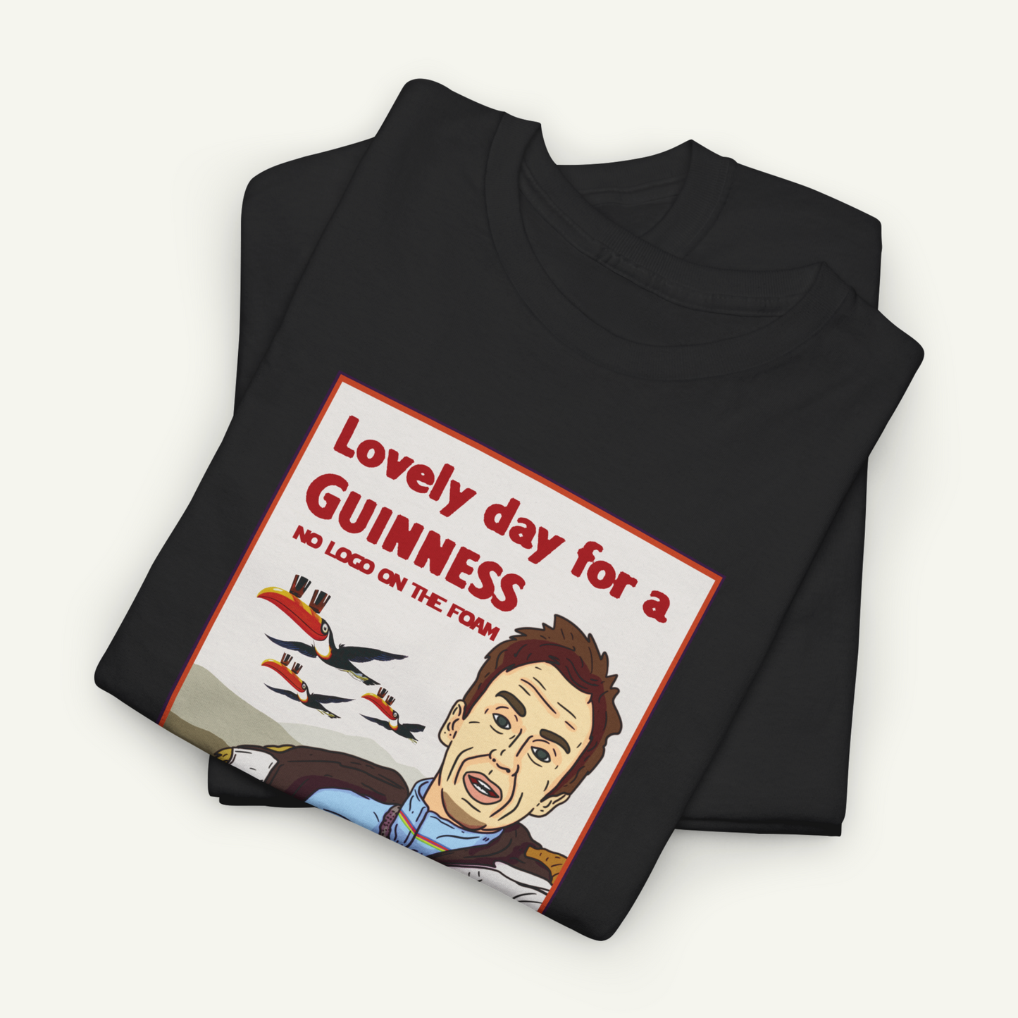 The image is a black t-shirt with a graphic design featuring a cartoon-style illustration of a man's face and the text "Lovely day for a Guinness" along with a humorous caption.
