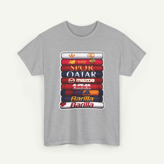 A gray t-shirt with a graphic design featuring a stack of various logos and text, including the logos of Nike, Adidas, SPOR, OAIAR, Mazda, and Barilla.